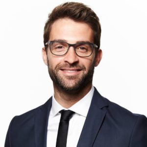 Smiling man in smart suit, portrait