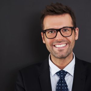 Portrait of handsome businessman wearing glasses